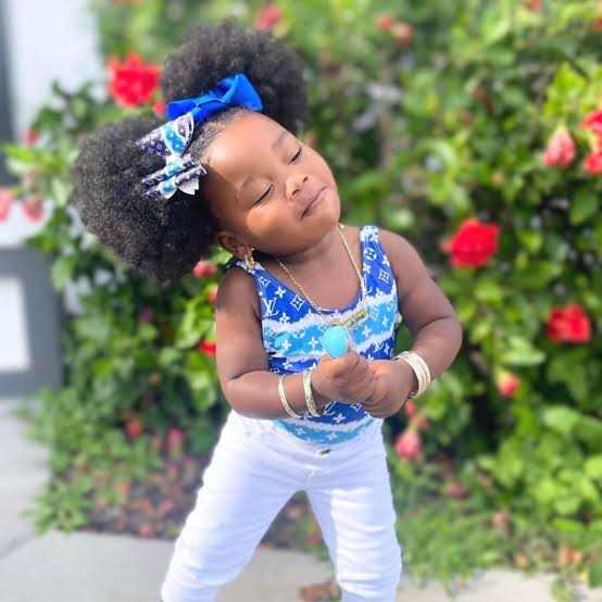 Coily Pigtails With Large Bow Coily Pigtails With Large Bow — Little Girl Hairstyles 2027