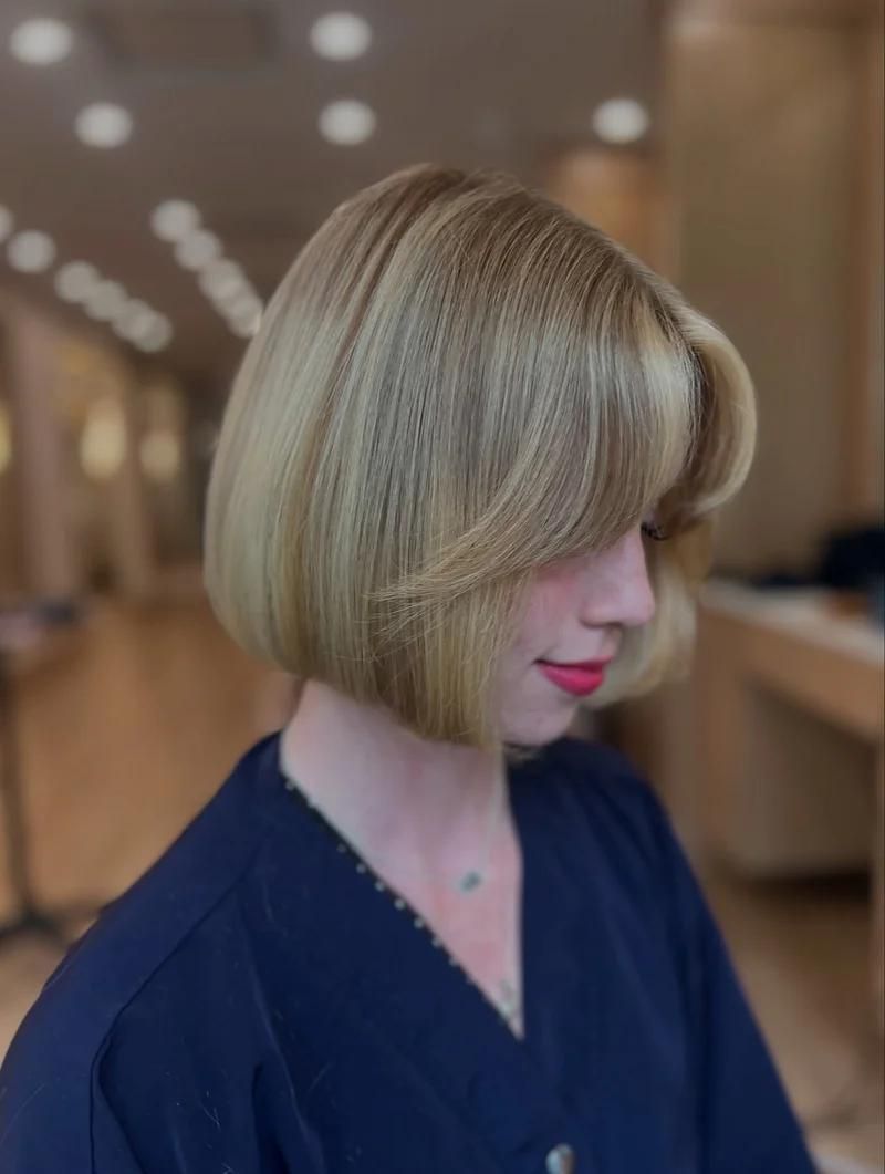 Layered Bob With Blended Curtain Bangs Layered Bob With Blended Curtain Bangs — Bob 2027 with Curtain Bangs