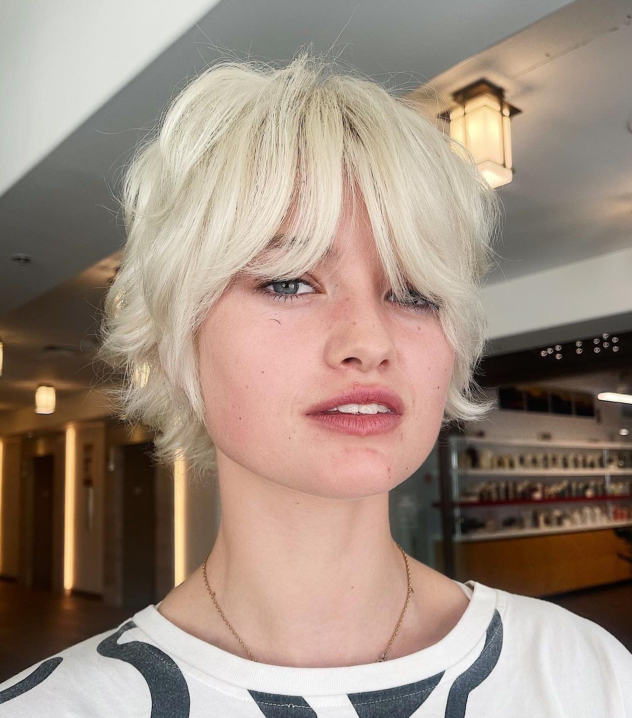 Shaggy Platinum Pixie With Curtain Bangs Shaggy Platinum Pixie With Curtain Bangs — Textured Pixie 2027