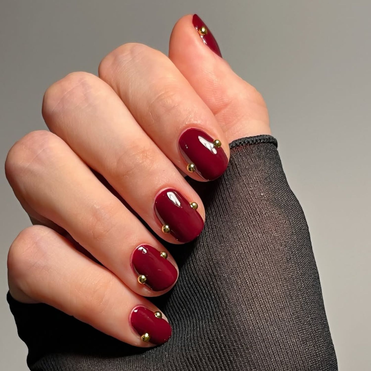 Deep Red Gold Stud Short Oval Nails Deep Red Gold Stud Short Oval Nails — Baddie Nails 2027