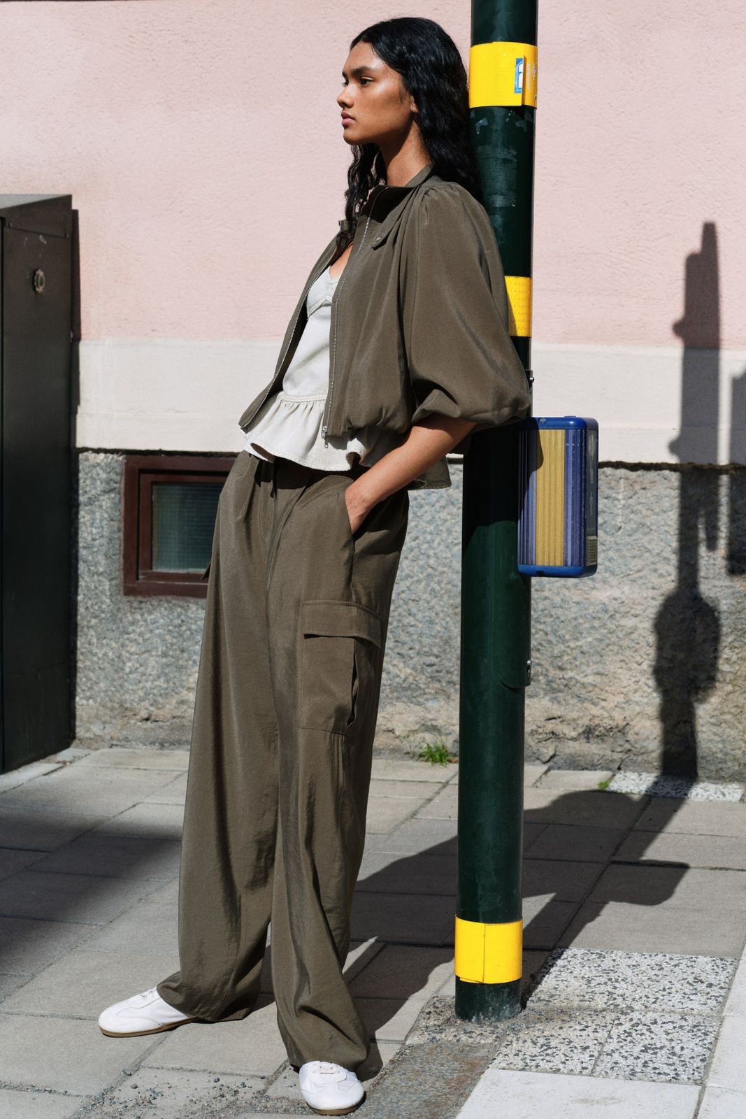 Casual Cool: Khaki Wide-Leg Cargos with Tank Top and Cap Casual Cool: Khaki Wide-Leg Cargos with Tank Top and Cap — Khaki Cargo Pants Outfits 2027