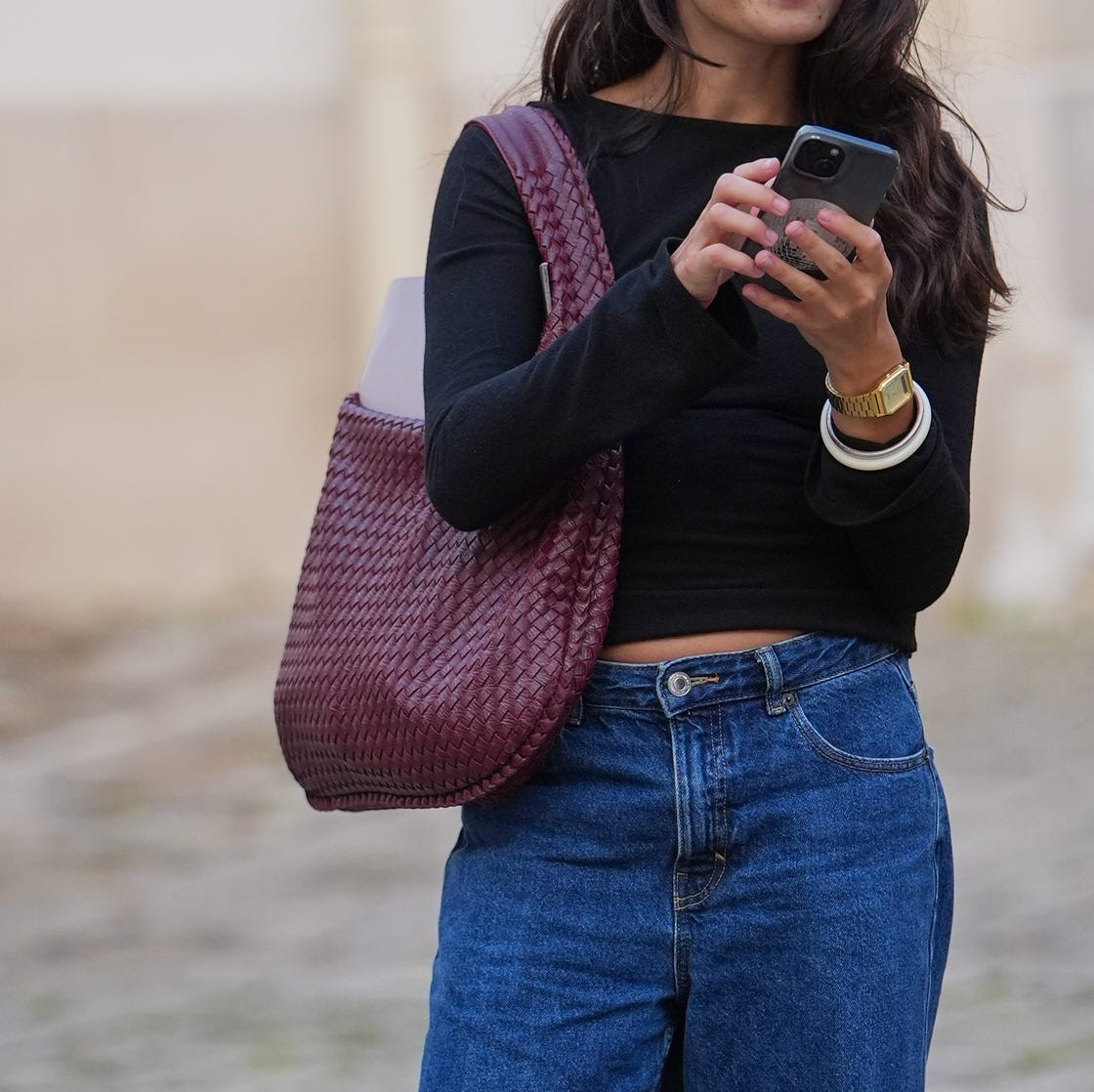Black Top, Denim Jeans, and Burgundy Woven Baguette Bag Black Top, Denim Jeans, and Burgundy Woven Baguette Bag — Baguette Bag Aesthetic 2027