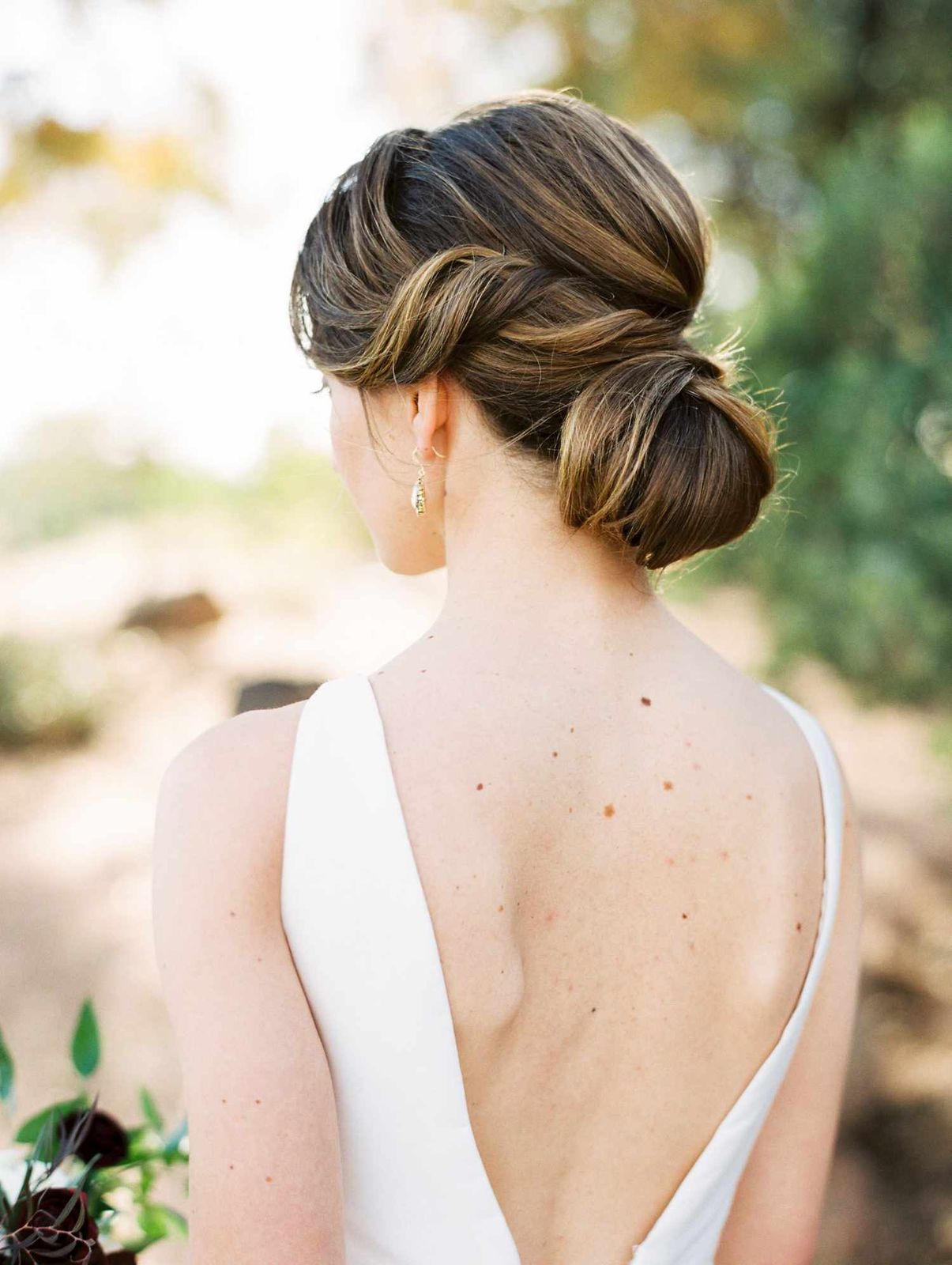 Dark Brown Wavy Collarbone Twisted Bun Dark Brown Wavy Collarbone Twisted Bun — Side Bun Hairstyles 2027