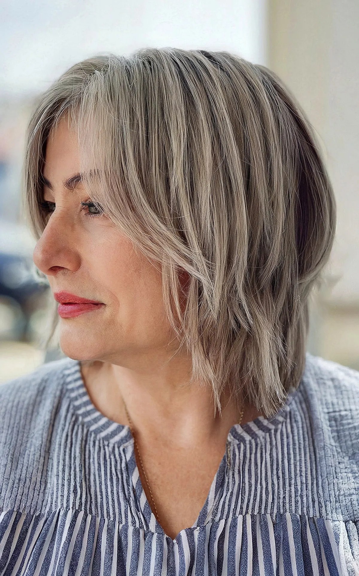 Ash Blonde Layered Bob With Blunt Bangs Ash Blonde Layered Bob With Blunt Bangs — Bangs 2027 for Women Over 50
