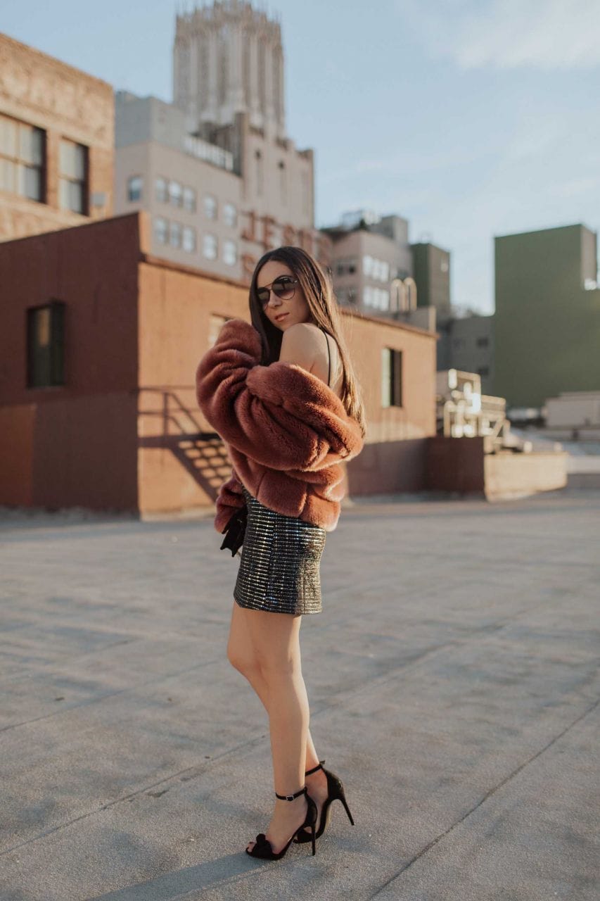 Sequin Mini Skirt with Oversized Faux Fur Jacket for NYE Sequin Mini Skirt with Oversized Faux Fur Jacket for NYE — Sequin New Years Eve Outfits 2027