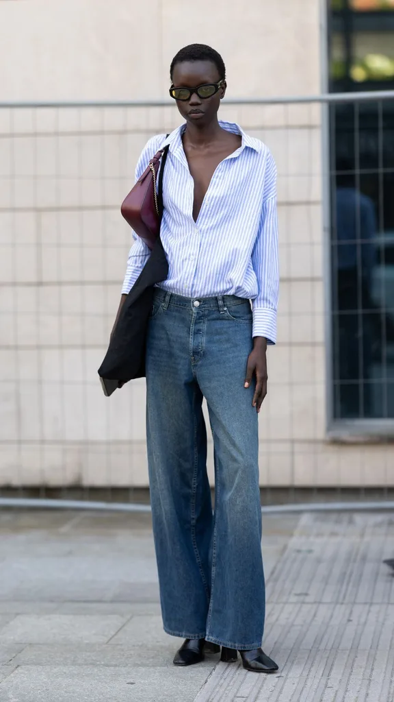 Striped Oversized Shirt with Dark Denim and Pointed Flats — Oversized Shirt Outfits 2027