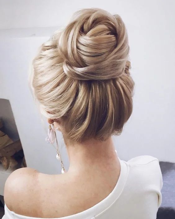 Sculpted High Twisted Bun Sculpted High Twisted Bun — Summer Updos 2027