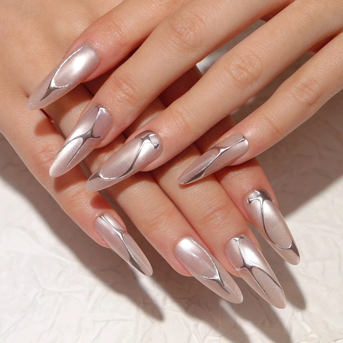 Flowing Silver Chrome Abstract Stilettos Flowing Silver Chrome Abstract Stilettos — Silver Nails 2027