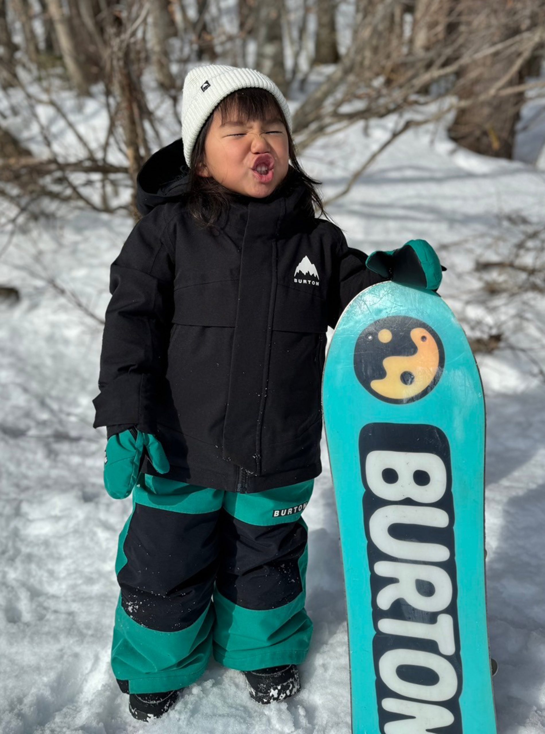 Kid's Black Hooded Jacket and Green Snow Pants for Winter Sports Fun — Snow Outfits 2027