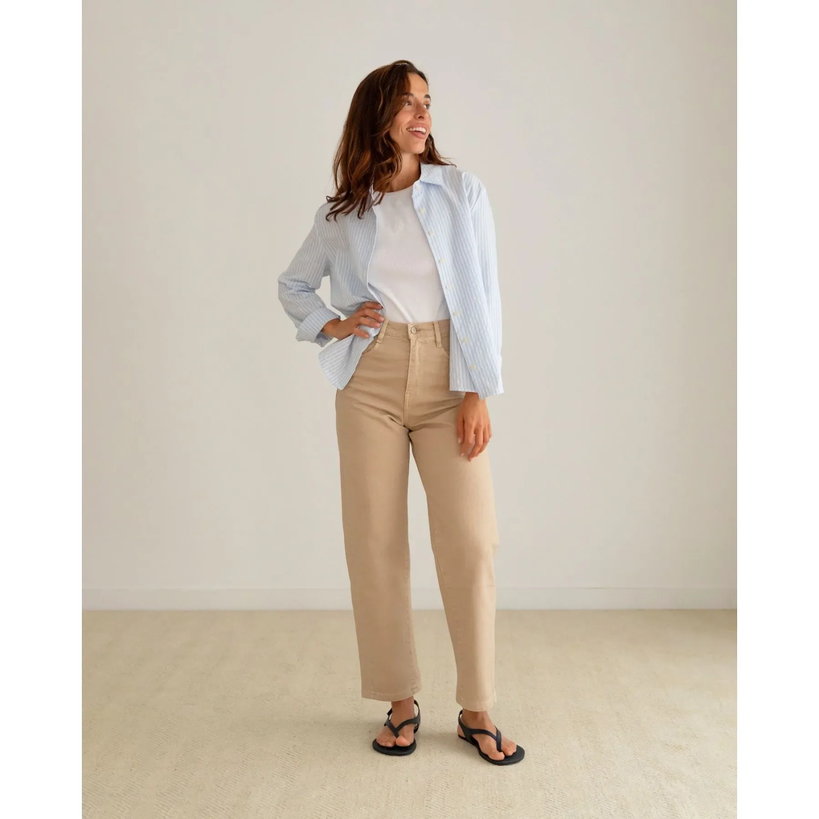 Beige Wide-Leg Pants with Striped Shirt and Black Flip-Flops — Beige Spring Outfits 2027