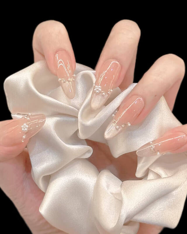 Sheer Pink Pearls and Rhinestones Almonds Sheer Pink Pearls and Rhinestones Almonds — Long Almond Nails 2027