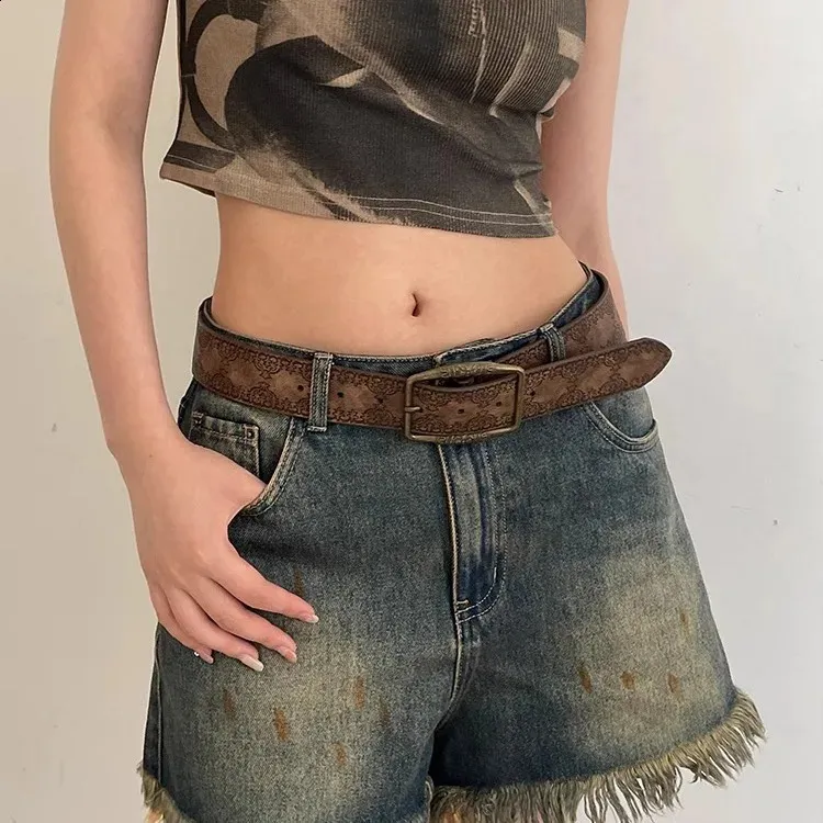 Distressed Denim Shorts and Crop Top with a Patterned Buckle Belt Distressed Denim Shorts and Crop Top with a Patterned Buckle Belt — Western Belt Outfits 2027