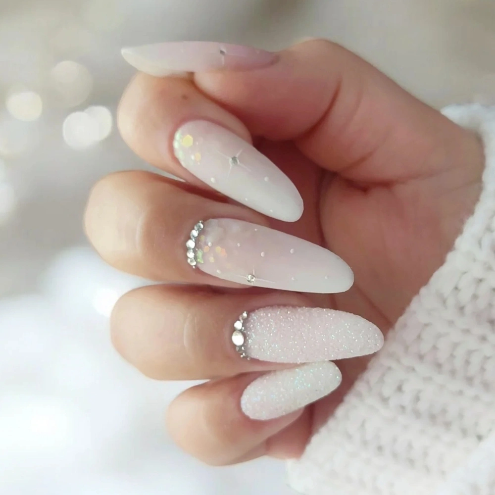 Glossy White with Textured Glitter Accents Glossy White with Textured Glitter Accents — Winter White Nails 2027