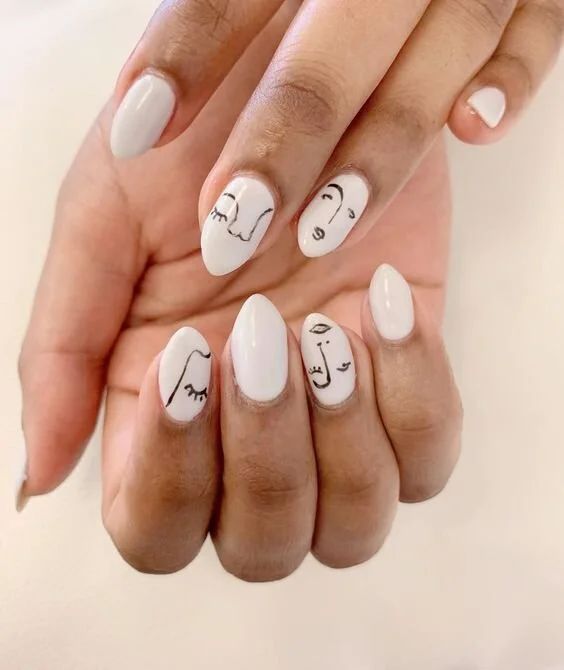 Minimalist Face Art White Almond Nails Minimalist Face Art White Almond Nails — Simple Gymnastics Nails 2027