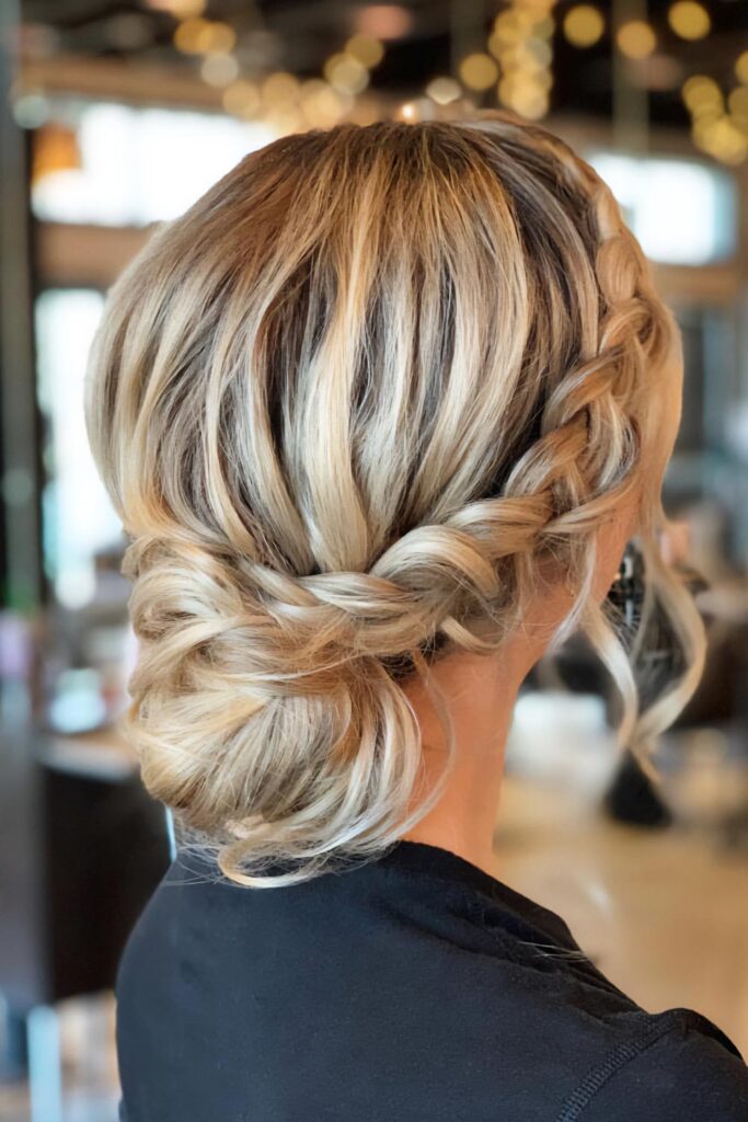 Braided Updo with Side Part — Holiday Party Hairstyles 2026