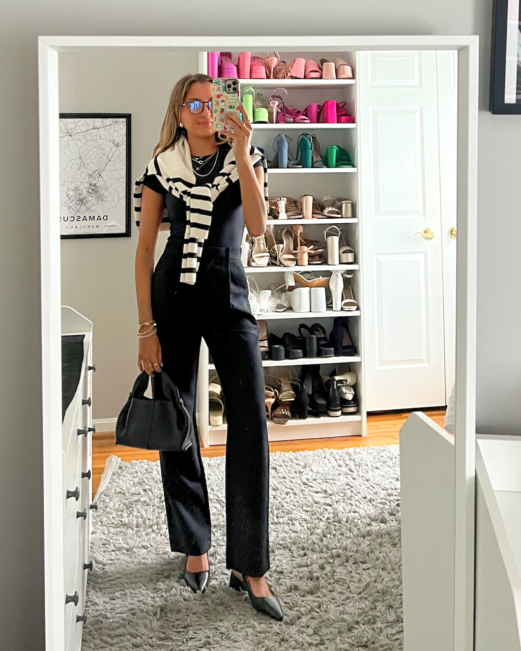 Chic Black Jumpsuit with a Draped Sweater for Effortless Style — First Day of Work Outfits 2027