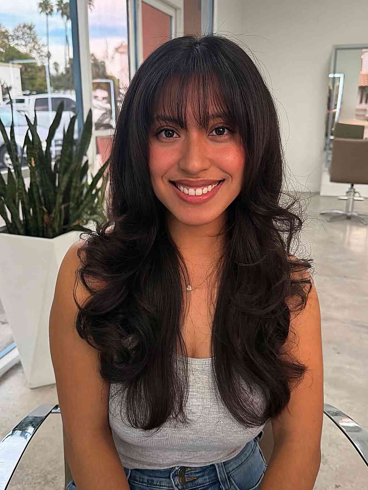 Long Layered Wavy Black Hair With Curtain Bangs Long Layered Wavy Black Hair With Curtain Bangs — Black Bangs 2027