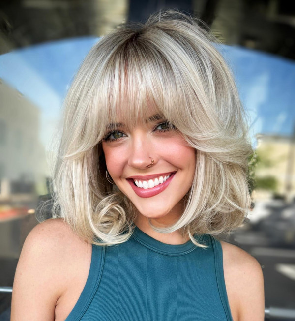 Ash Blonde Shag With Voluminous Bangs Ash Blonde Shag With Voluminous Bangs — Low Maintenance Bangs 2027