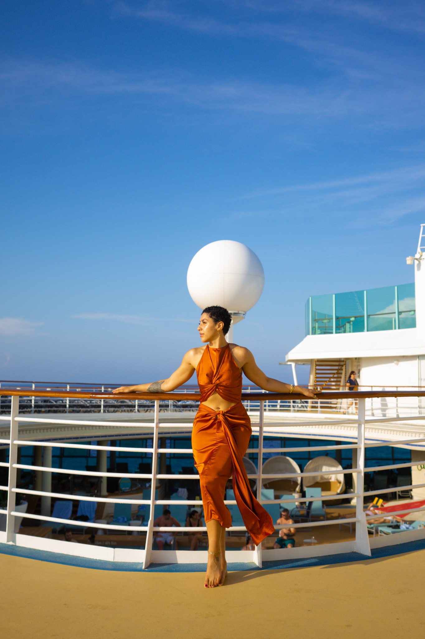 Dramatic Burnt Orange Halter Maxi Dress for Cruise Evenings — Cruise Outfits 2027