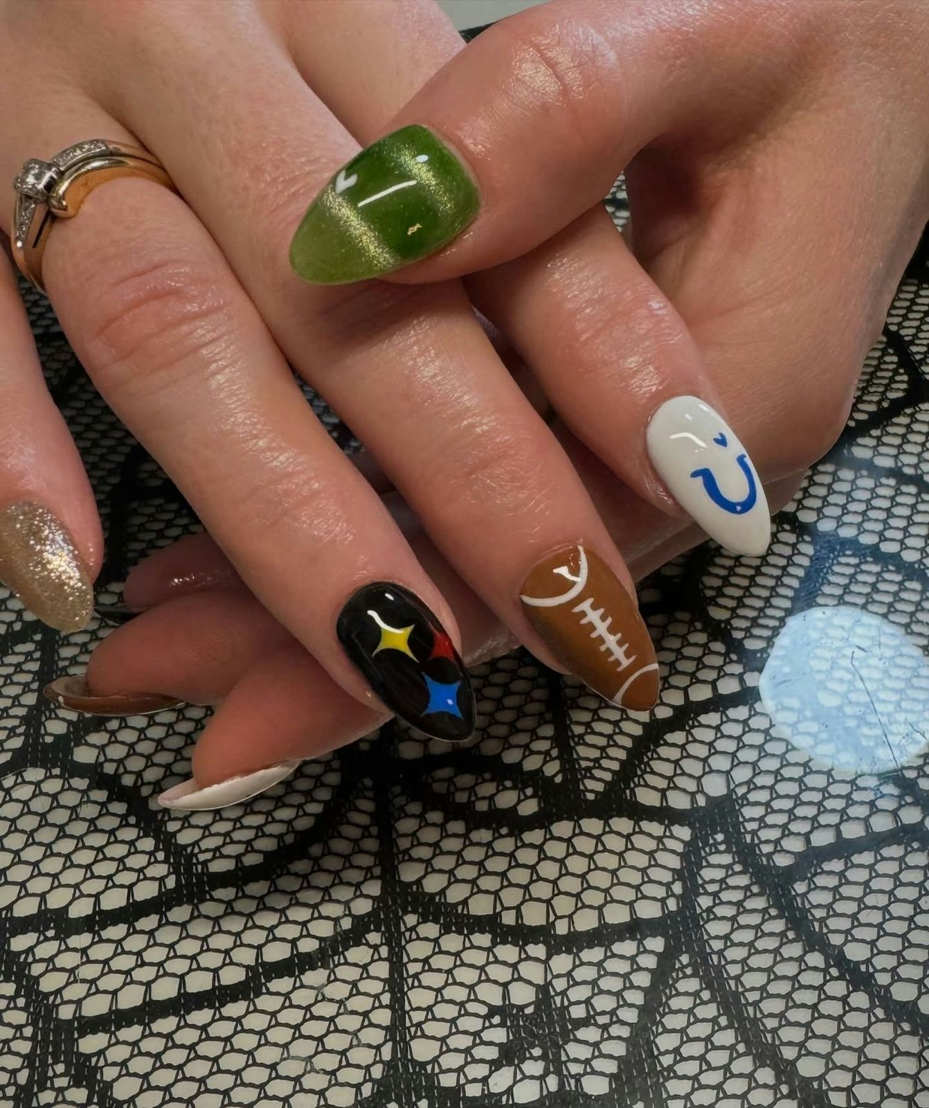 Football Cat-Eye and Steelers Logo Football Cat-Eye and Steelers Logo — Cheer Nails Team Colors 2027