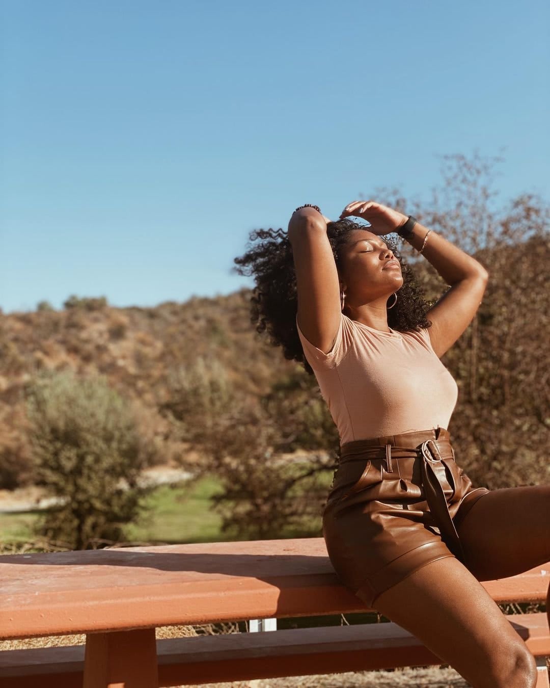 Beige Bodysuit and Brown Leather Shorts: Textured Neutral Outfit — Earth Tone Outfits 2027