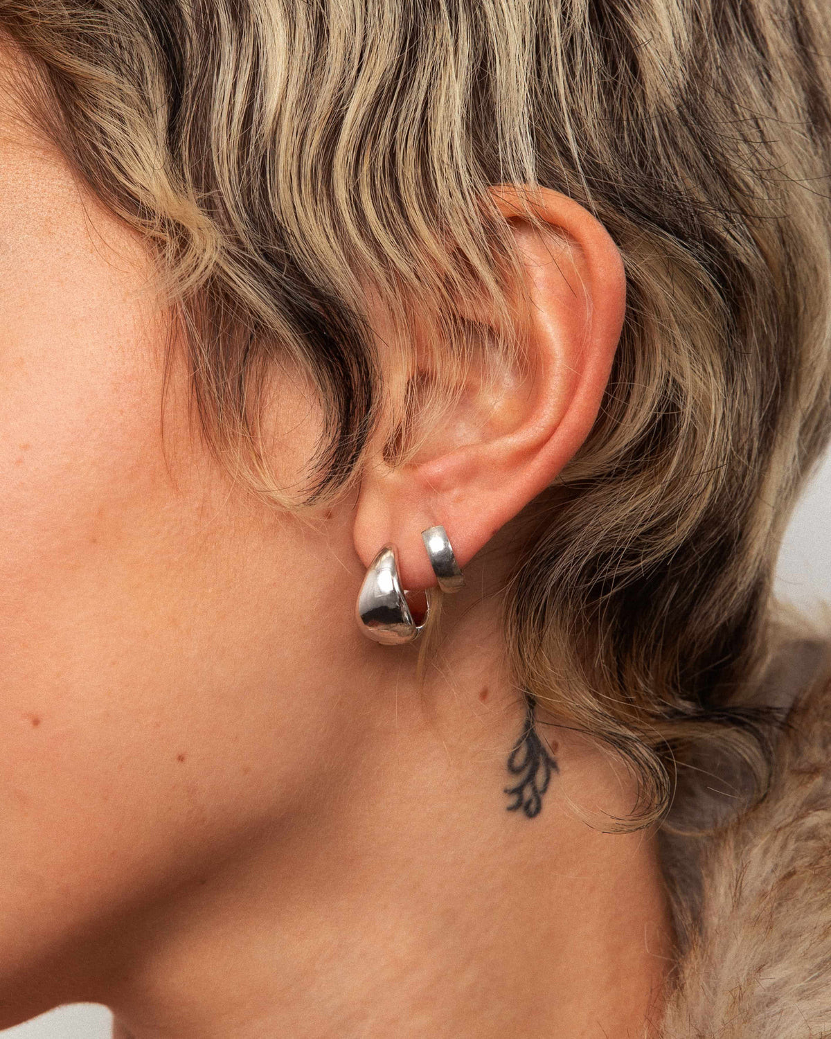 Silver Waterdrop Hoops with a Fur-Trimmed Coat Silver Waterdrop Hoops with a Fur-Trimmed Coat — Hoop Earrings 2027