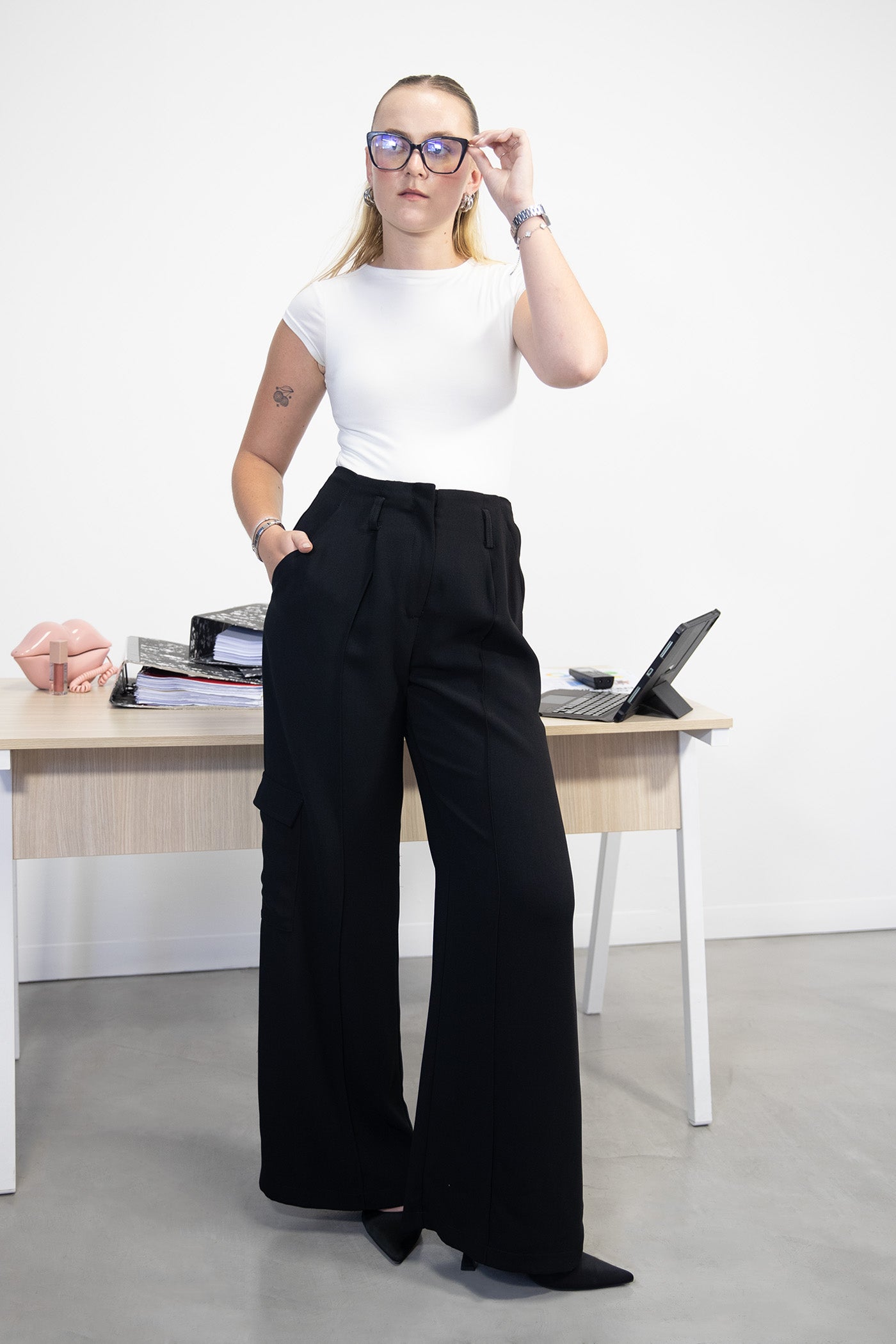 Clean White Top with Black Wide-Leg Trousers and Pink Clutch — Corporate Baddie Outfits 2027