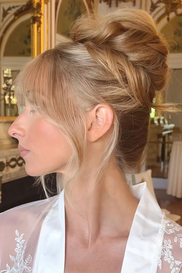 Messy Bun With Wispy Bangs Messy Bun With Wispy Bangs — Wedding Bangs 2027