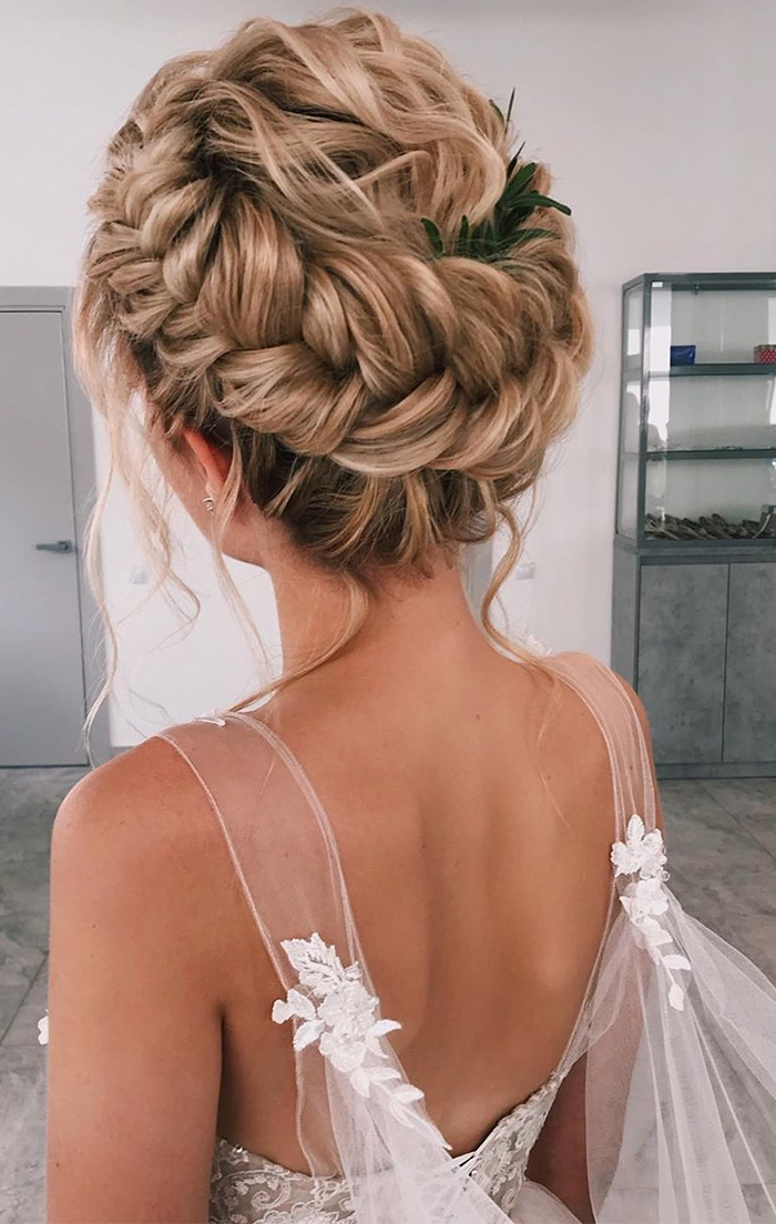 Mid-Back Blonde Intricate Braided Updo With Leaves — Beach Wedding Hair 2027