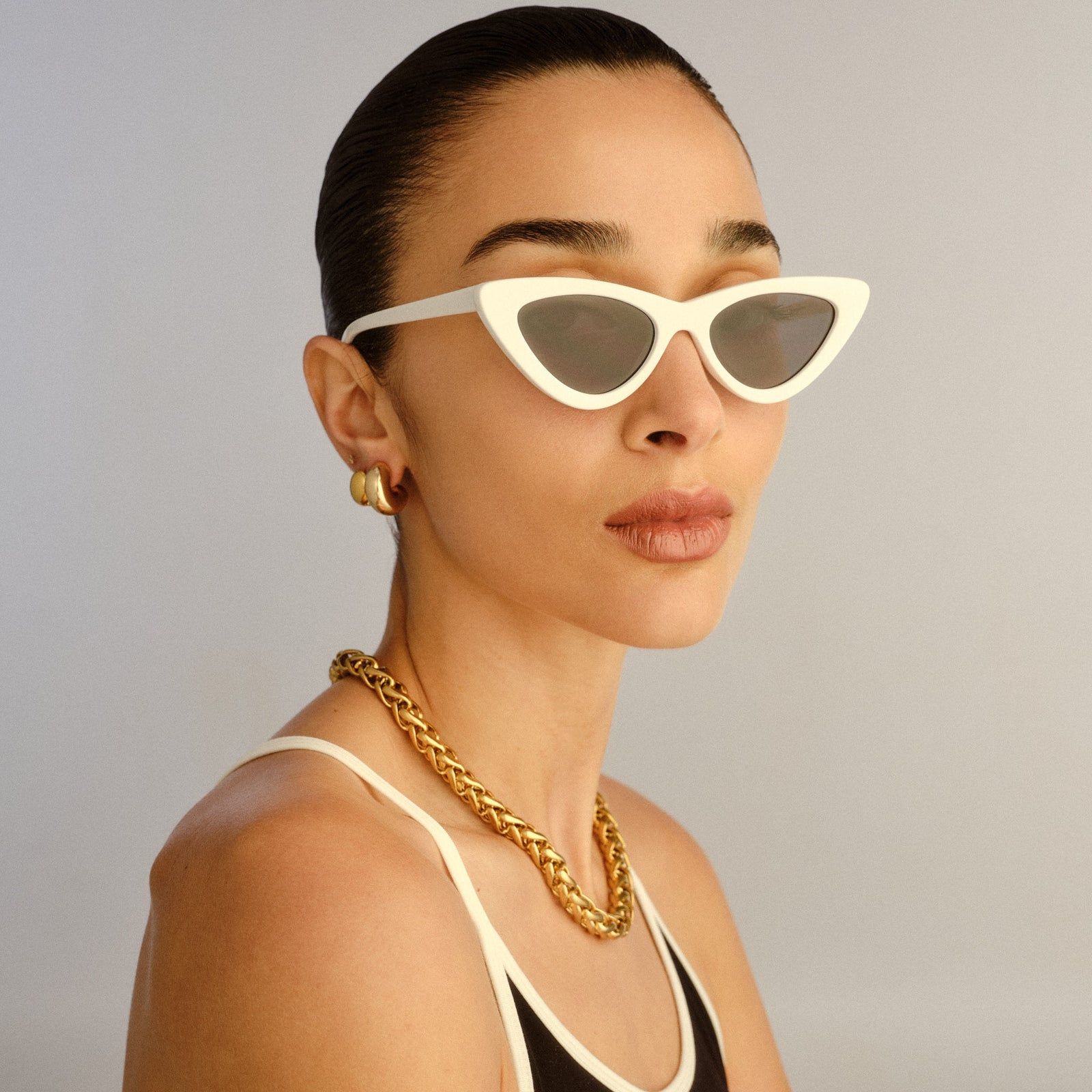 Bold White Cat Eyes with Gold Accents — Cat Eye Sunglasses Outfits 2027