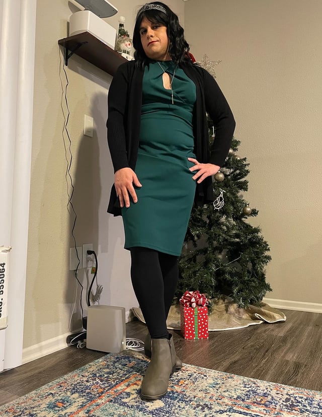 Fitted Green Dress with Black Cardigan for Christmas Gathering — Green Christmas Outfits 2026