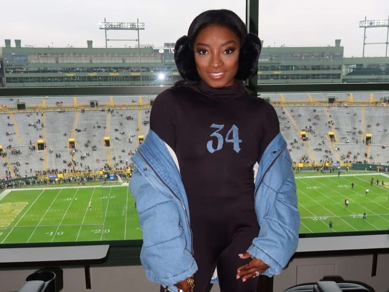 Jumpsuit Layering: Denim Jacket Over Black Jumpsuit — Game Day Outfits 2026