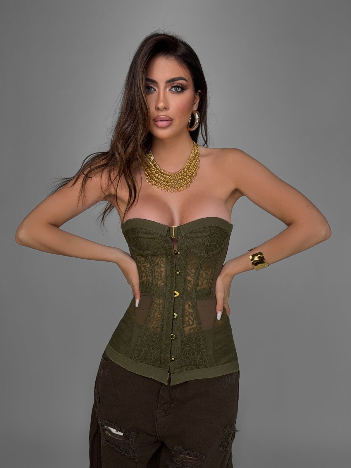 Edgy Elegance: Olive Green Lace Corset with Dark Trousers and Gold Jewelry Edgy Elegance: Olive Green Lace Corset with Dark Trousers and Gold Jewelry — Coquette Corset Top Outfits 2027