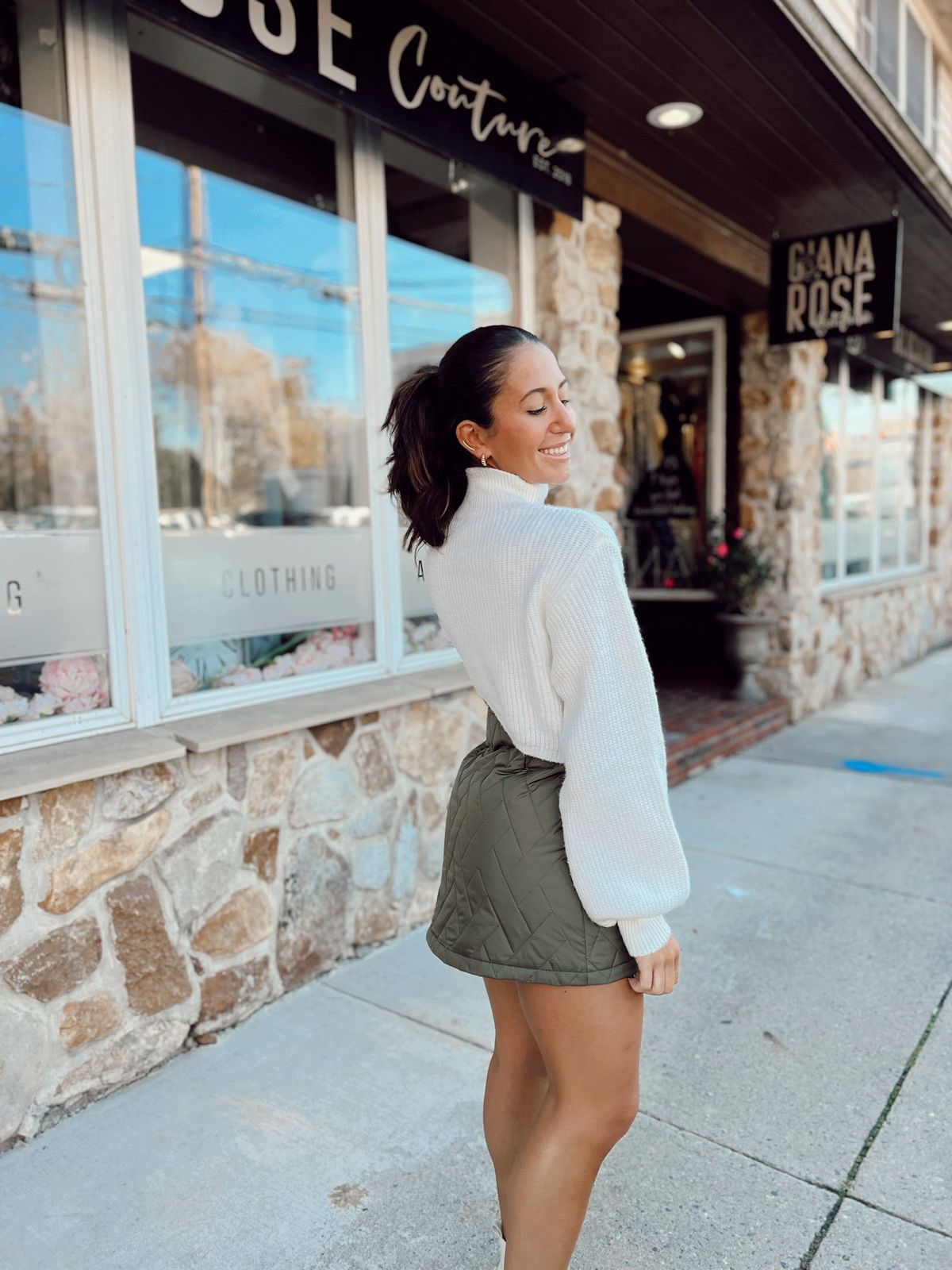 Fitted Olive Green Quilted Mini Skirt with White Sweater and Boots Fitted Olive Green Quilted Mini Skirt with White Sweater and Boots — Olive Green Mini Skirt Outfits 2027