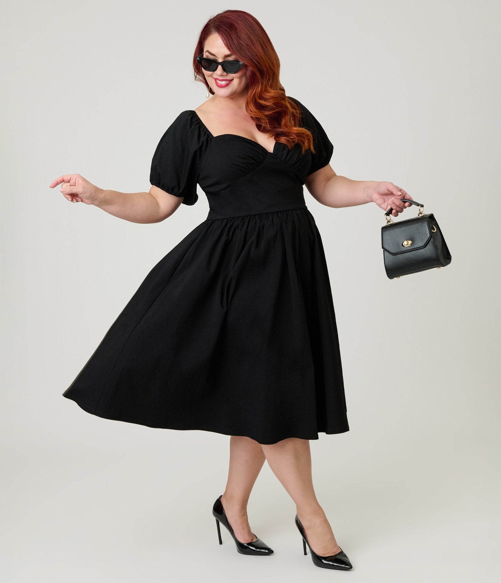 Black Puff Sleeve Swing Dress for Cocktail Occasions Black Puff Sleeve Swing Dress for Cocktail Occasions — Puff Sleeve Dresses 2027