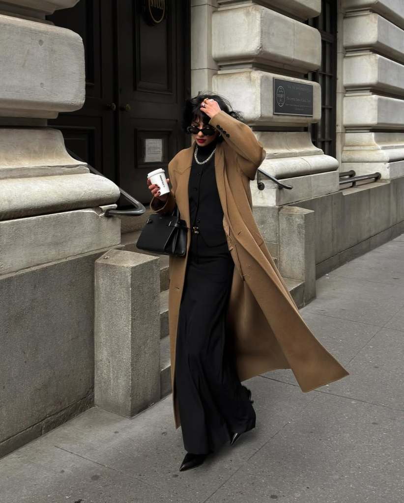 Long Camel Coat over Black Vest and Trousers Long Camel Coat over Black Vest and Trousers — Winter Outfits 2027 for Work