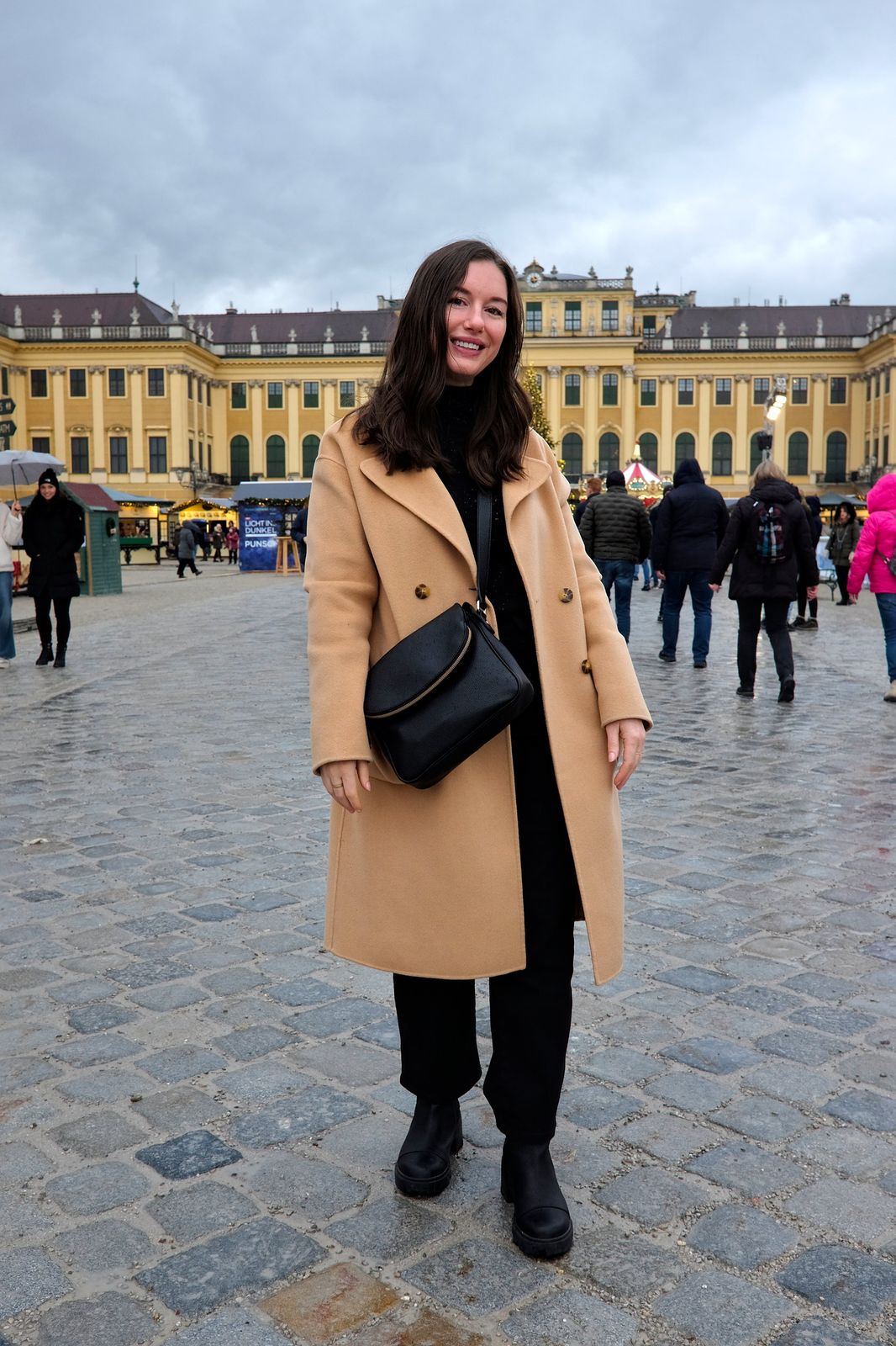 Long Camel Coat and Black Pants for Effortless Elegance — Christmas Market Outfits 2026