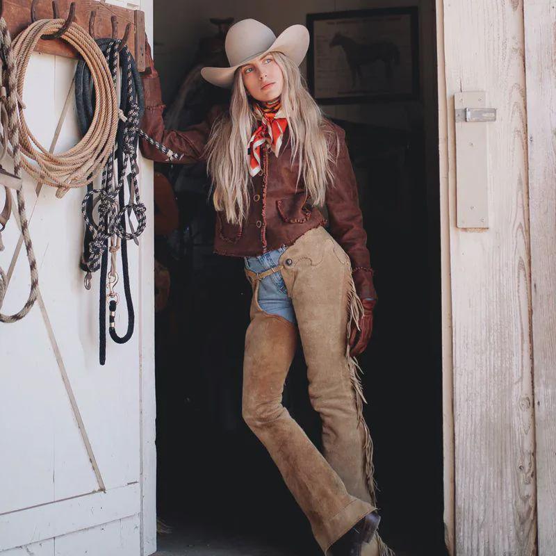 Leather Jacket, Suede Chaps, and Cowboy Boots for a Full Western Look — Winter Western Outfits 2027