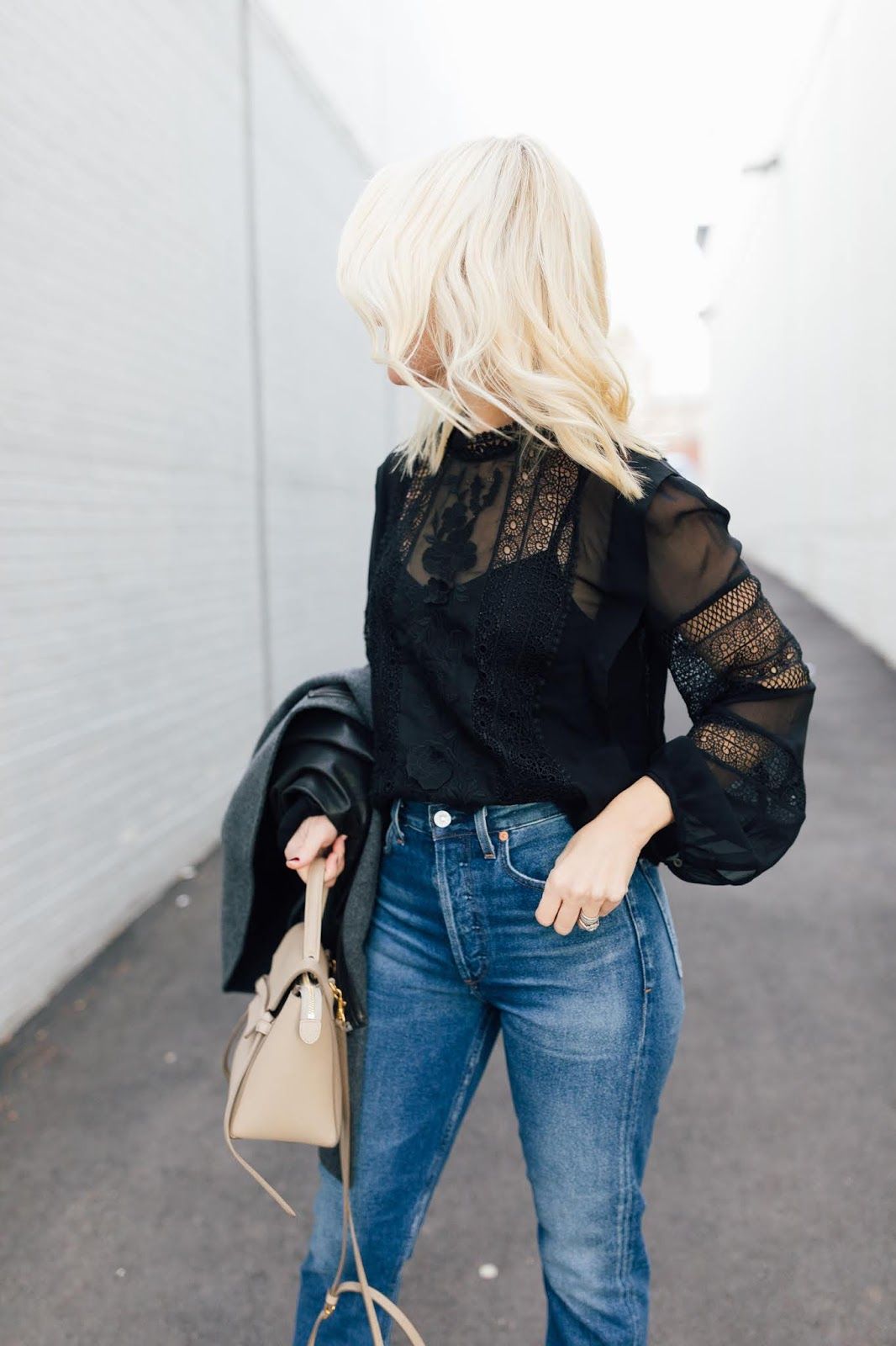 Black Sheer Lace Blouse: Bold Texture for an Evening Out Black Sheer Lace Blouse: Bold Texture for an Evening Out — Date Night Blouse Outfits 2027