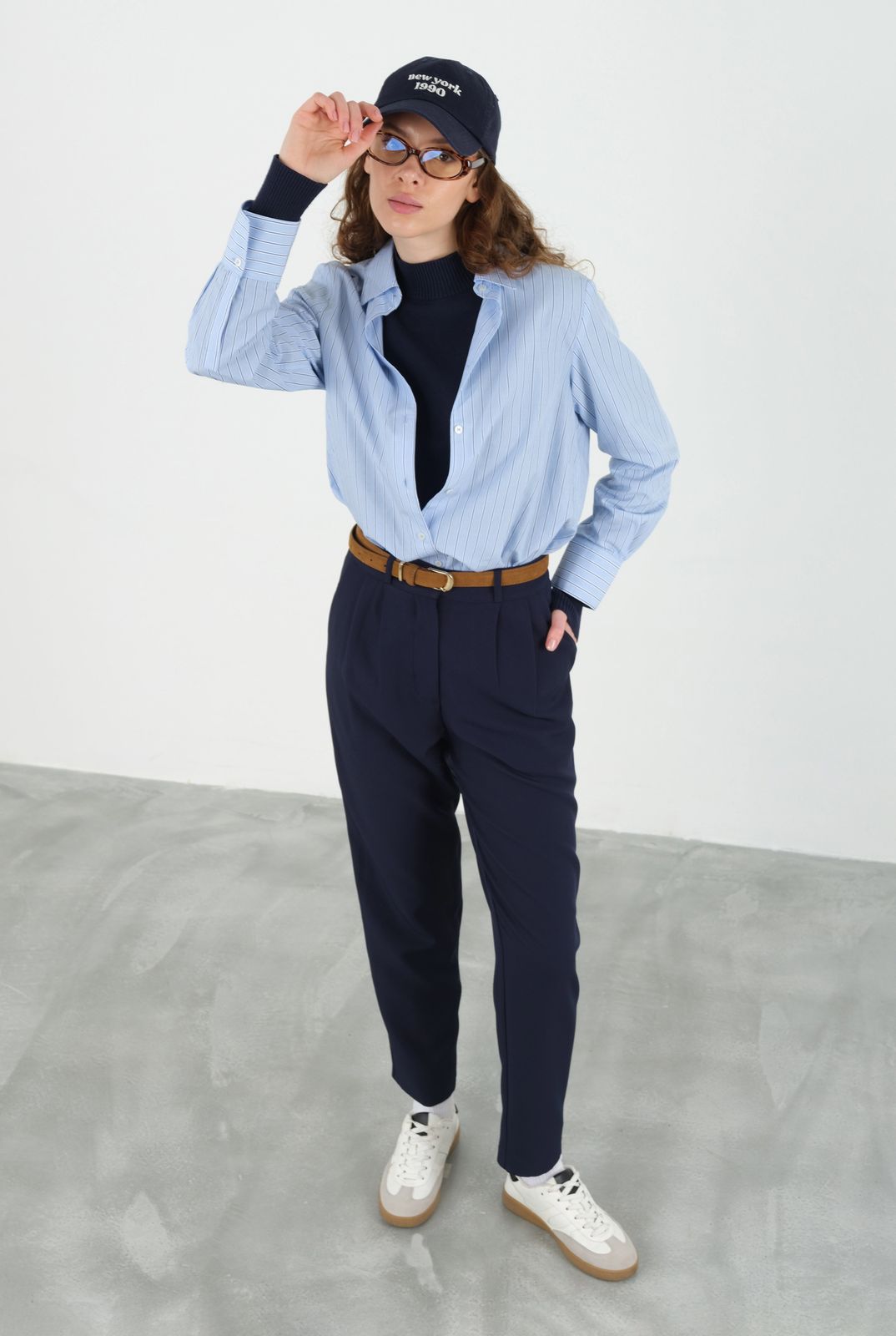 White Sneakers Outfit Idea White Sneakers Outfit Idea — Navy Blue Pleated Pants Outfits 2027