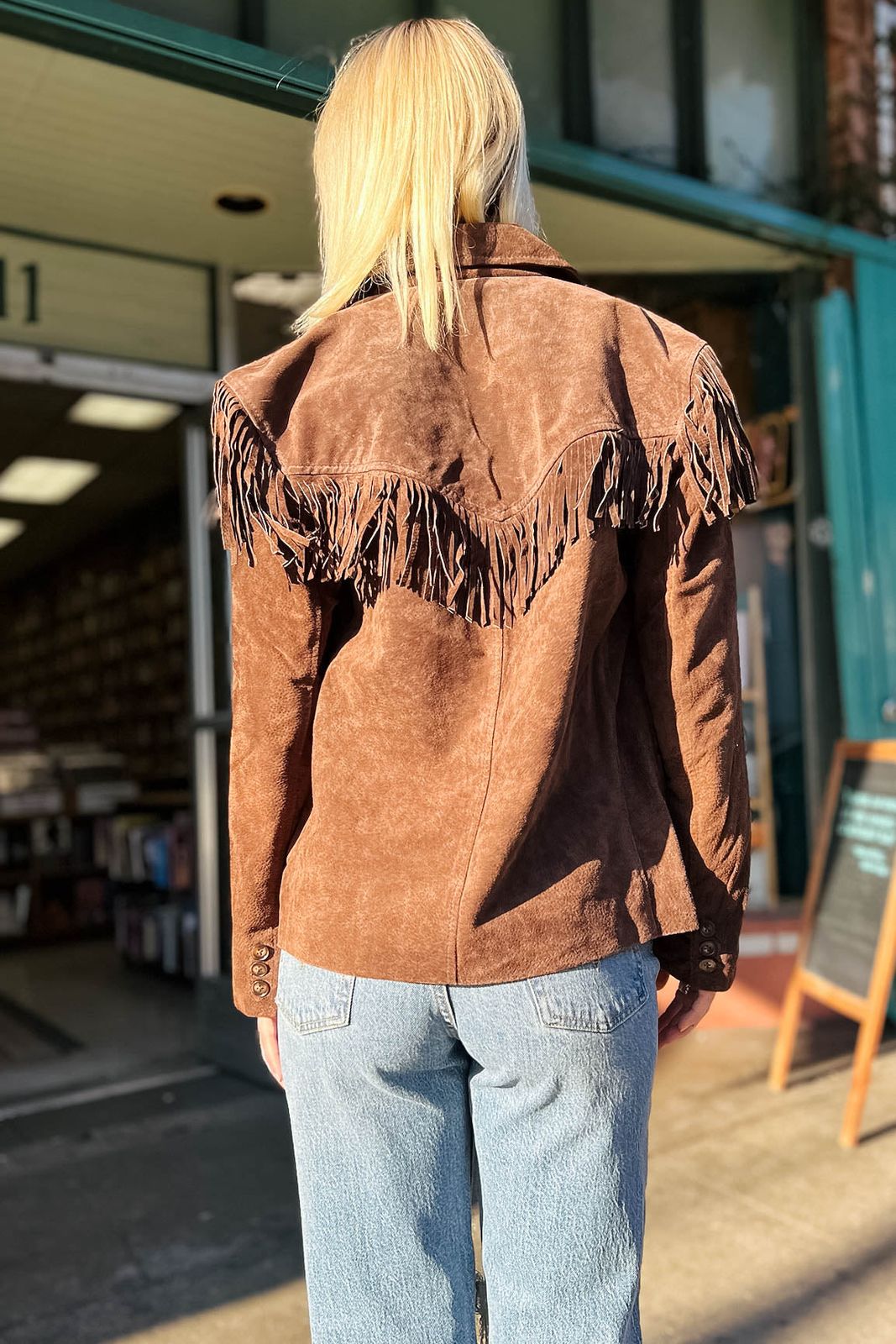 Back Detail Focus: Brown Suede Fringe Jacket from Behind Back Detail Focus: Brown Suede Fringe Jacket from Behind — Fringe Jacket Outfits 2027