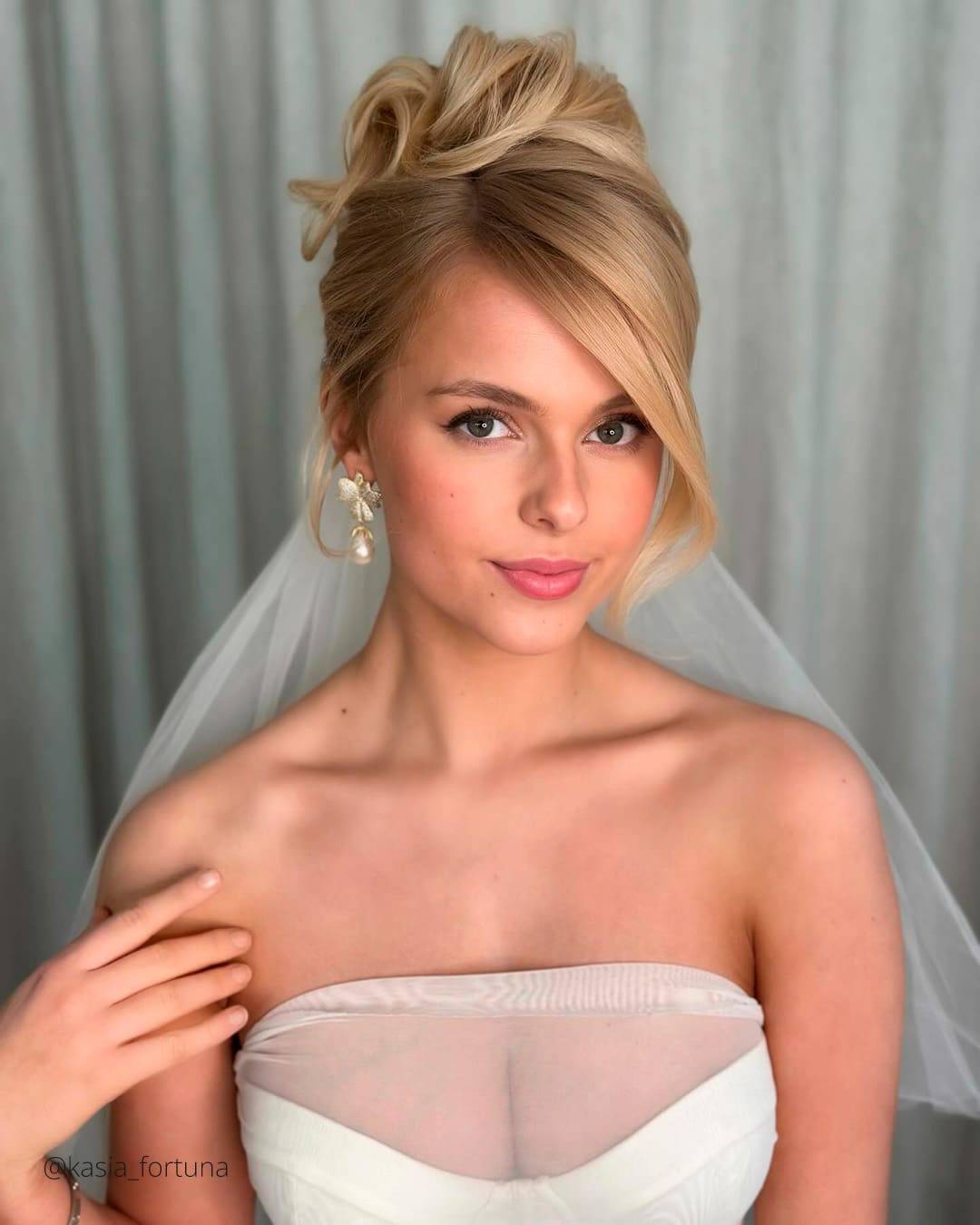 Warm Blonde Voluminous Updo With Wispy Bangs Warm Blonde Voluminous Updo With Wispy Bangs — Wedding Bangs 2027