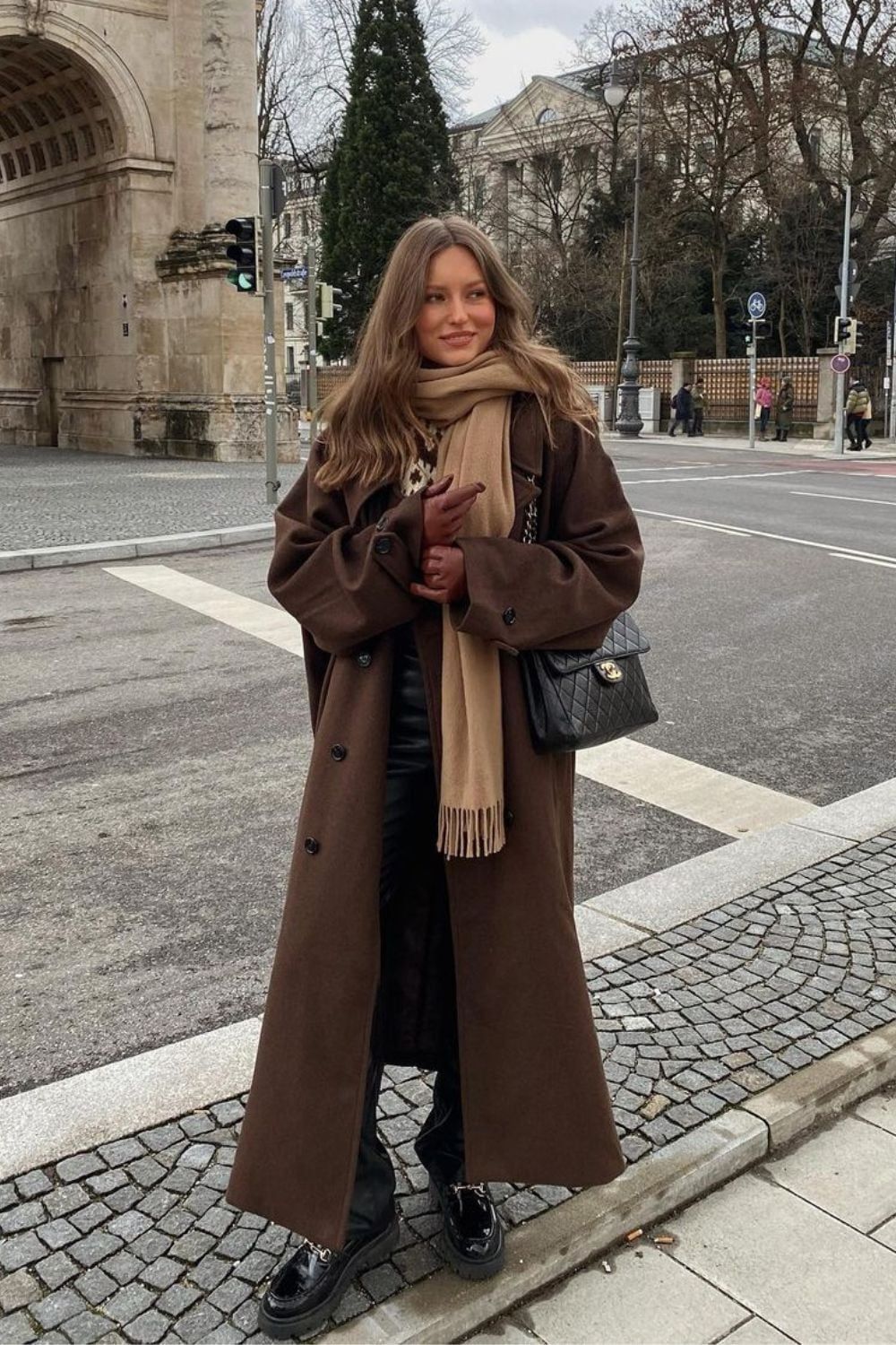 Long Dark Brown Wool Coat with Chunky Loafers and Leather Trousers Long Dark Brown Wool Coat with Chunky Loafers and Leather Trousers — Brown Coat Outfits 2027