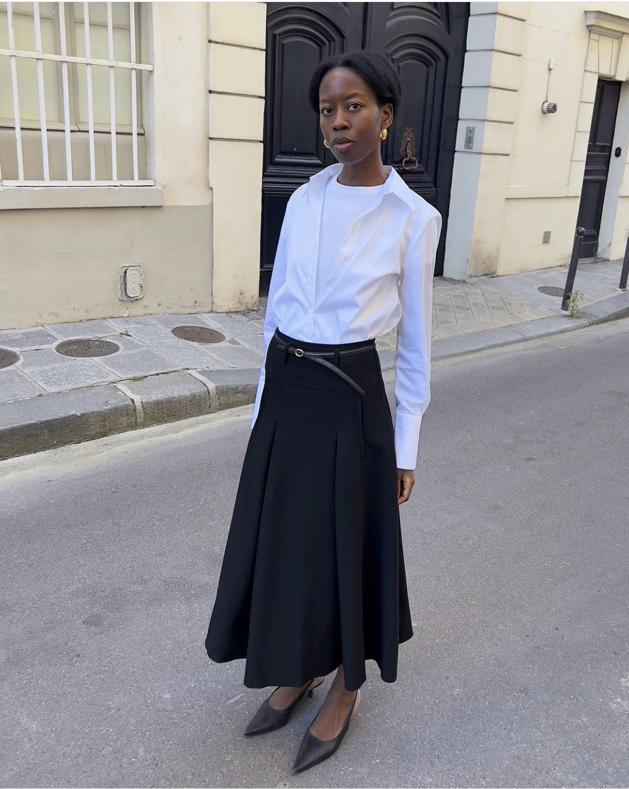 Sophisticated Monochrome: Button-Down Shirt and Black Midi Skirt Sophisticated Monochrome: Button-Down Shirt and Black Midi Skirt — Modest Outfits 2027