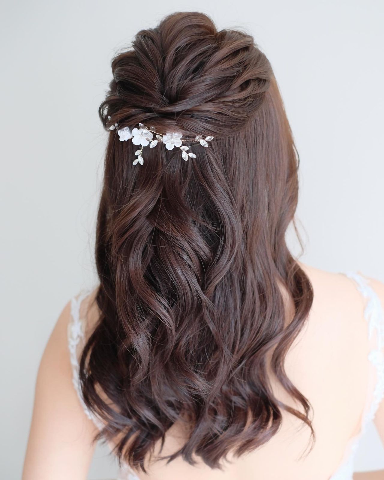 Mid-Back Dark Brown Half-Up With Floral Accessory Mid-Back Dark Brown Half-Up With Floral Accessory — Bridal Hair Down 2027