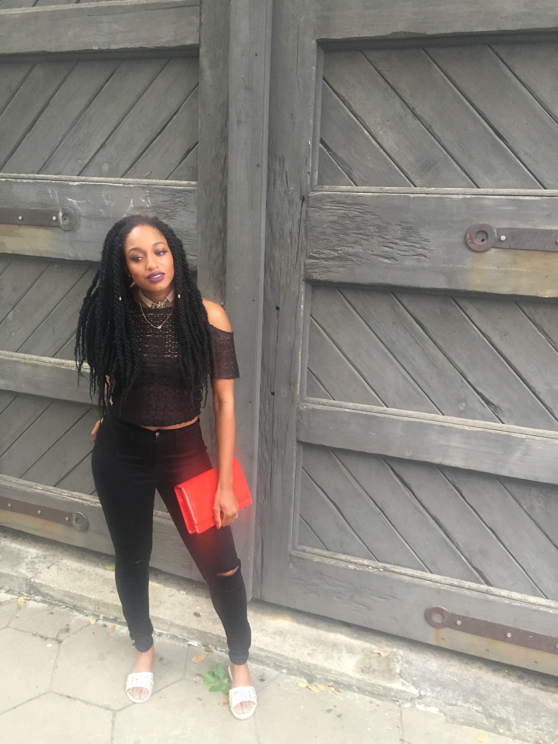 Black Off-the-Shoulder Top and Distressed Skinny Jeans — Concert Outfits 2027