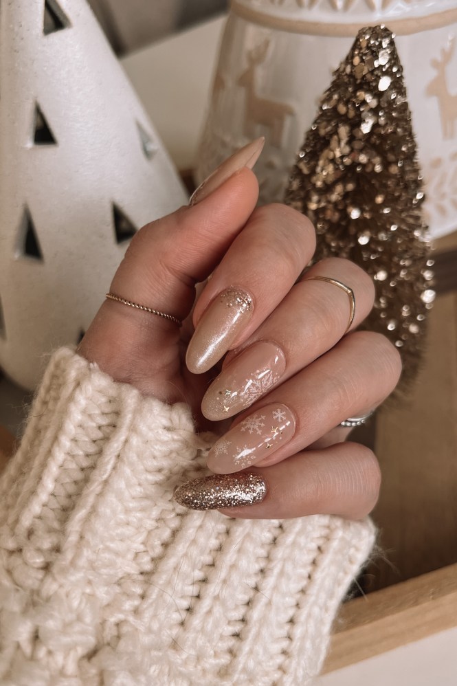 Nude Champagne Glitter Snowflake Long Almond Nails Nude Champagne Glitter Snowflake Long Almond Nails — Neutral Christmas Nails 2026
