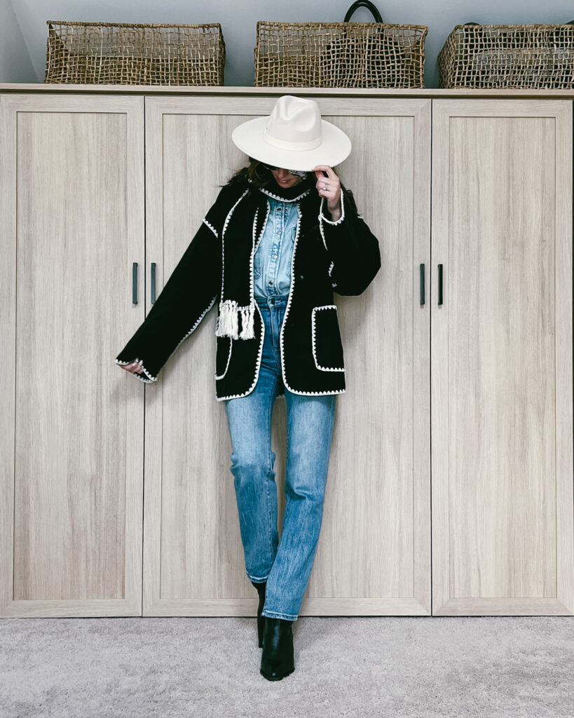 Knit Jacket with White Trim Over Denim and Turtleneck — Winter Western Outfits 2027