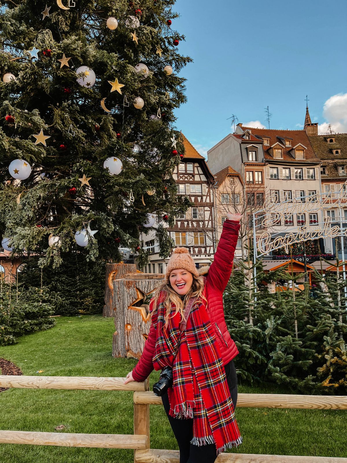 Red Puffer Jacket with Plaid Scarf for a Cozy Market Visit — Christmas Market Outfits 2026