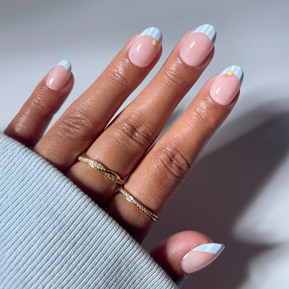 Sheer Pink French Tips with Stripe Accents Sheer Pink French Tips with Stripe Accents — Oval Nails 2027